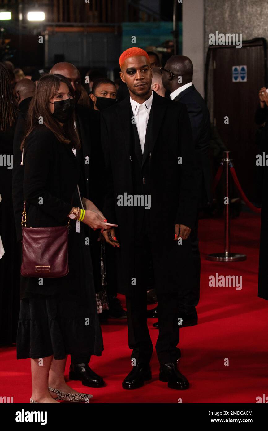 Kid Cudi poses for photographers upon arrival at the opening of the