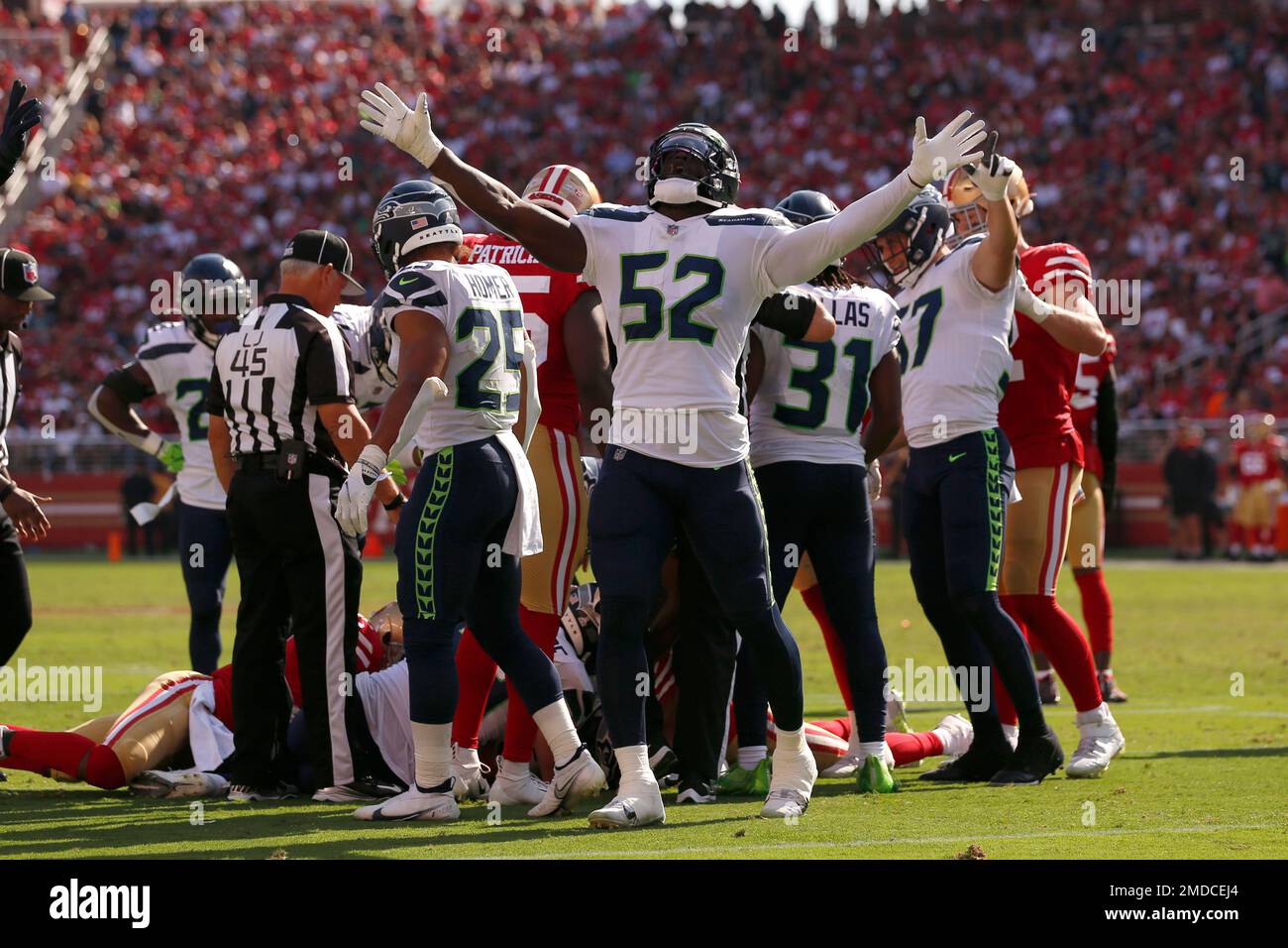 Seattle Seahawks defensive end Darrell Taylor (52) looks into the backfield  during an NFL football game against the San Francisco 49ers, Sunday, Sept.  18, 2022, in Santa Clara, Calif. (AP Photo/Scot Tucker