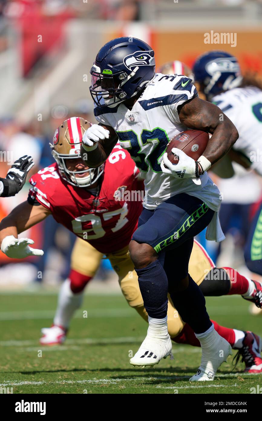 Seattle, United States. 3rd Oct, 2019. Seattle Seahawks running back Chris  Carson (32) catches the winning 5-yard touchdown pass against the Los  Angeles Rams at CenturyLink Field during the fourth quarter in