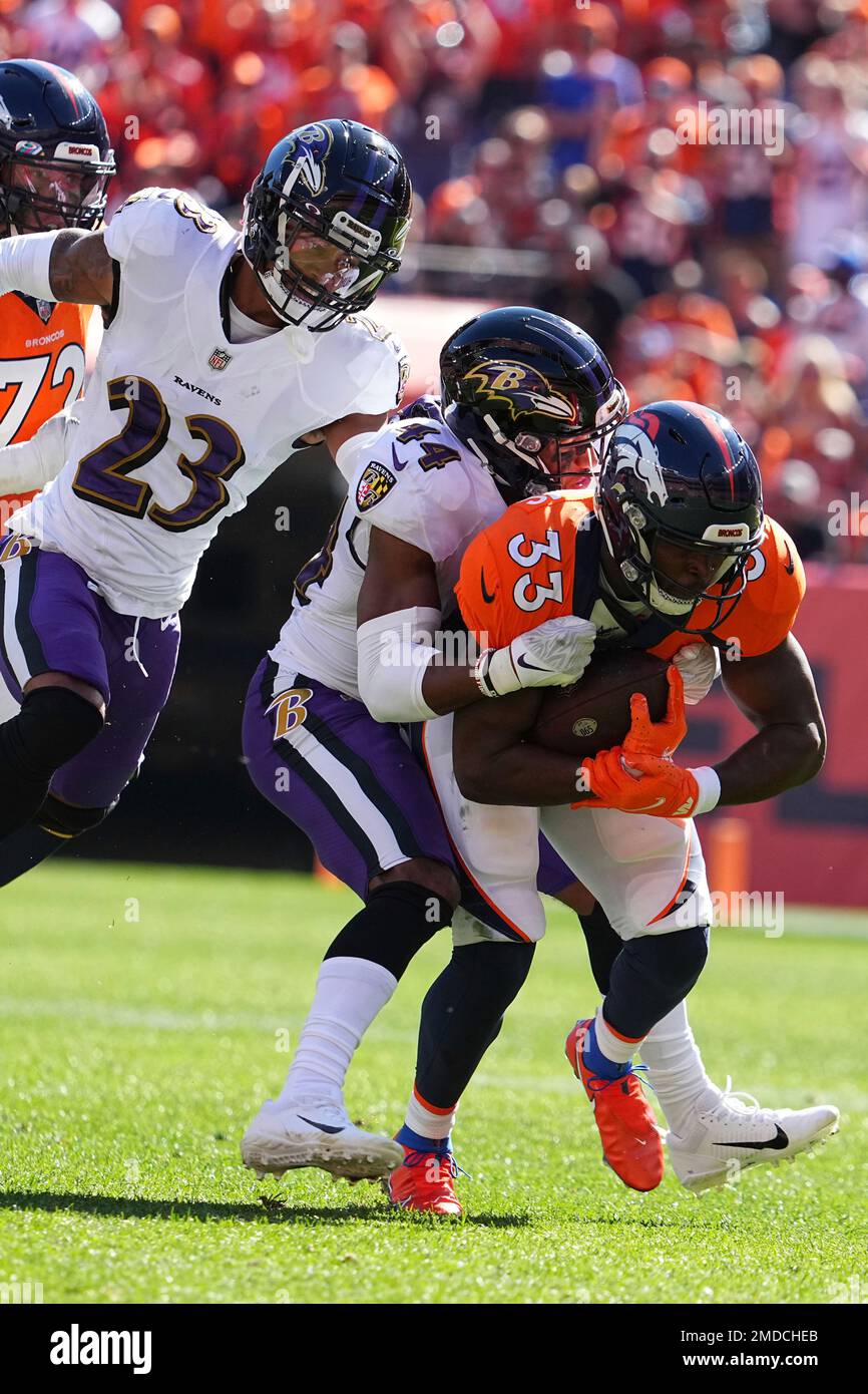 Denver Broncos running back Javonte Williams (33) celebrates his touchdown  run against the Los Angeles Chargers during the first half of an NFL  football game, Sunday, Nov. 28, 2021, in Denver. (AP