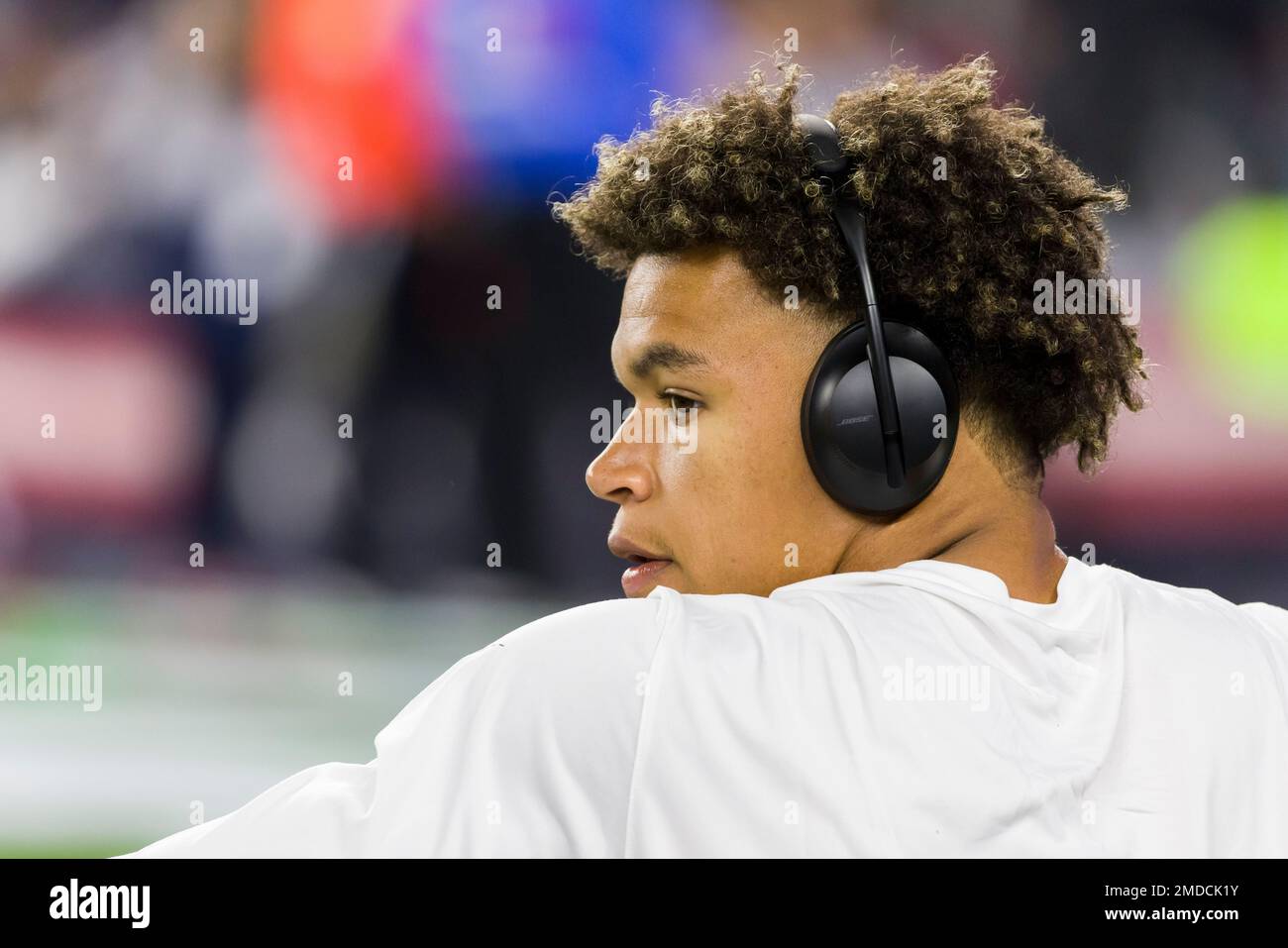 Tampa Bay Buccaneers linebacker Joe Tryon-Shoyinka (9) stretches out prior  to an NFL football game against the New England Patriots, Sunday, Oct. 3,  2021, in Foxborough, Mass. (AP Photo/Greg M. Cooper Stock