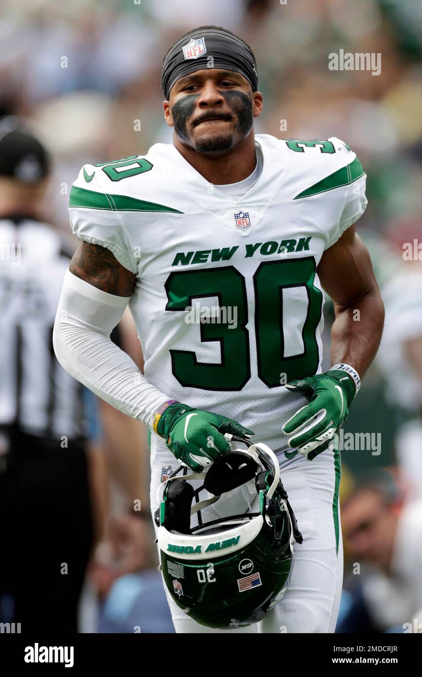 New York Jets running back Michael Carter (32) looks on against the New  England Patriots during an NFL football game Sunday, Oct. 30, 2022, in East  Rutherford, N.J. (AP Photo/Adam Hunger Stock