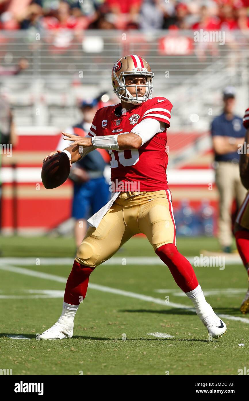 San Francisco 49ers quarterback Jimmy Garoppolo during an NFL football game  against the Seattle Seahawks, Sunday, Dec. 5, 2021, in Seattle. The Seahawks  won 30-23. (AP Photo/Ben VanHouten Stock Photo - Alamy