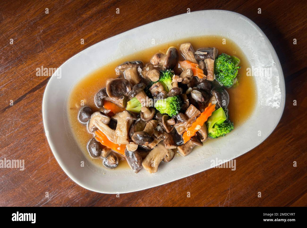 stir fried mushroom with broccoli carrot vegetable, shiitake mushrooms