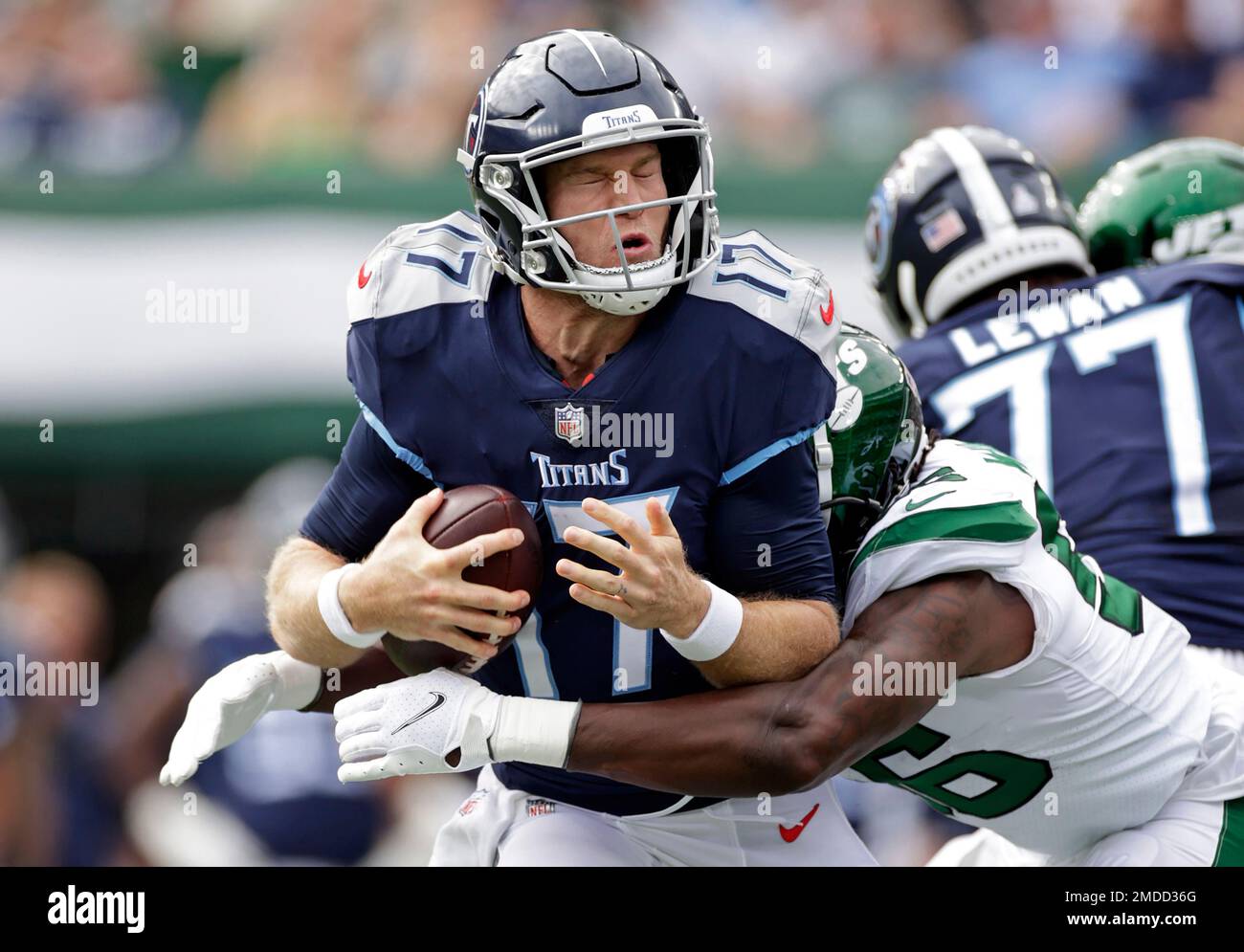 Tennessee Titans quarterback Ryan Tannehill (17) is sacked by New