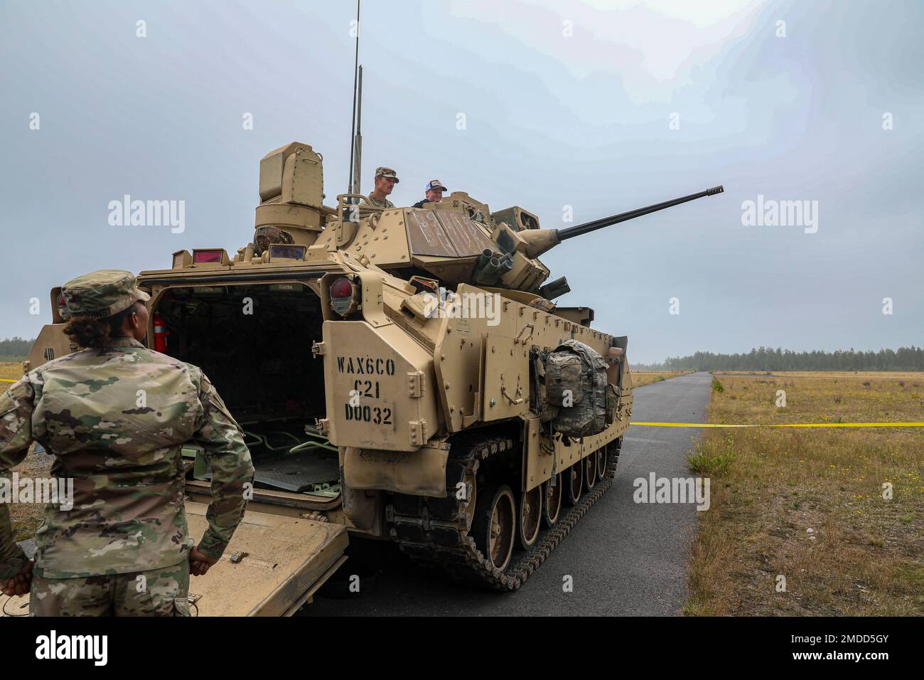 U.S. Soldiers assigned to the 4th Squadron, 10th Cavalry Regiment, 3rd Armored Brigade Combat Team, 4th Infantry Division, stage a U.S. Army M2 Bradley Fighting Vehicle for a static display during the Oripää Airshow at Säkylä, Finland, July 16, 2022. The 3rd Armored Brigade Combat Team, 4th Infantry Division, and the Pori Brigade of the Finnish army began summer training in Finland to strengthen relations and help build interoperability between the two nations. Stock Photo