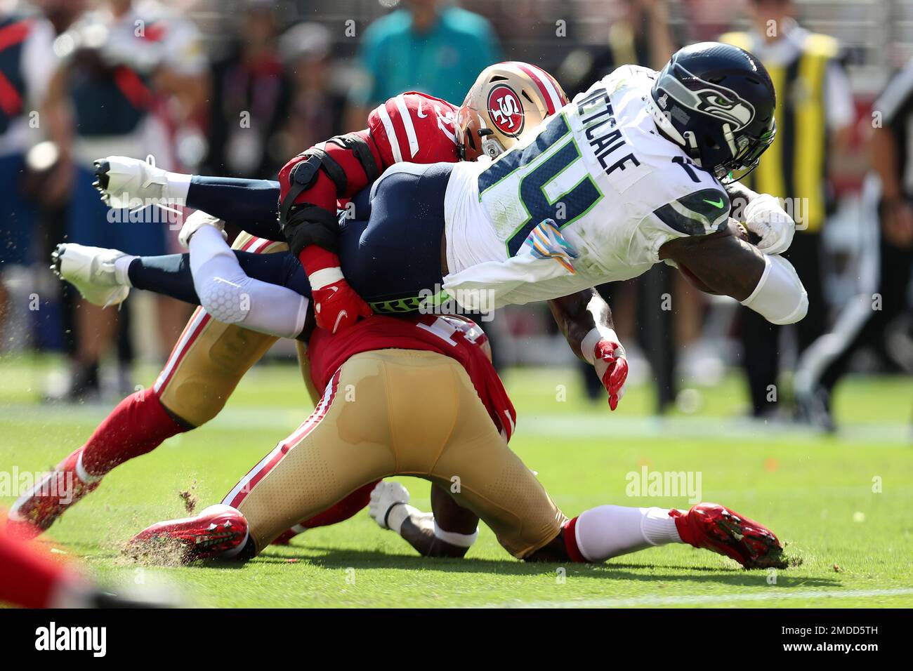 Seattle Seahawks wide receiver DK Metcalf (14) scores against San Francisco 49ers linebacker