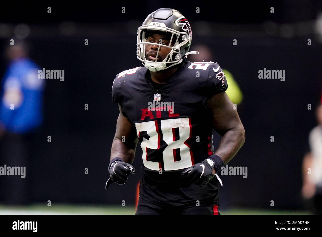 Atlanta Falcons running back Mike Davis (28) works against the Washington  Football Team during the second half of an NFL football game, Sunday, Oct. 3,  2021, in Atlanta. (AP Photo/Brynn Anderson Stock