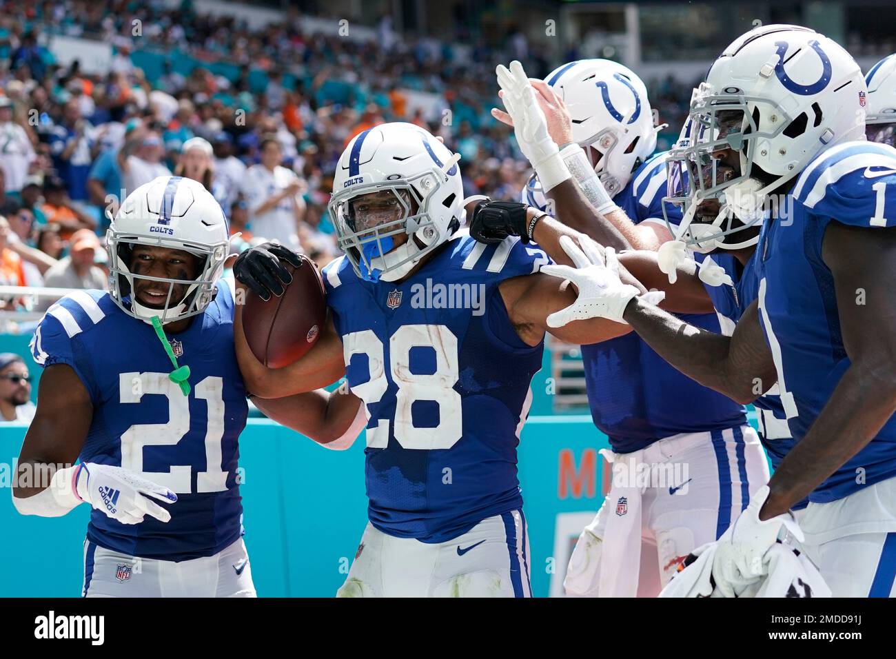 Indianapolis Colts' Nyheim Hines, left, and Jacksonville Jaguars' Will  Richardson Jr. hold autographed jerseys following an NFL football game,  Sunday, Nov. 17, 2019, in Indianapolis. Indianapolis won 33-13. (AP  Photo/Michael Conroy Stock