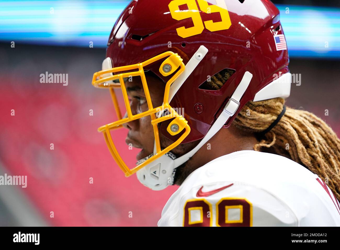 Washington Football Team defensive end Chase Young (99) warms up