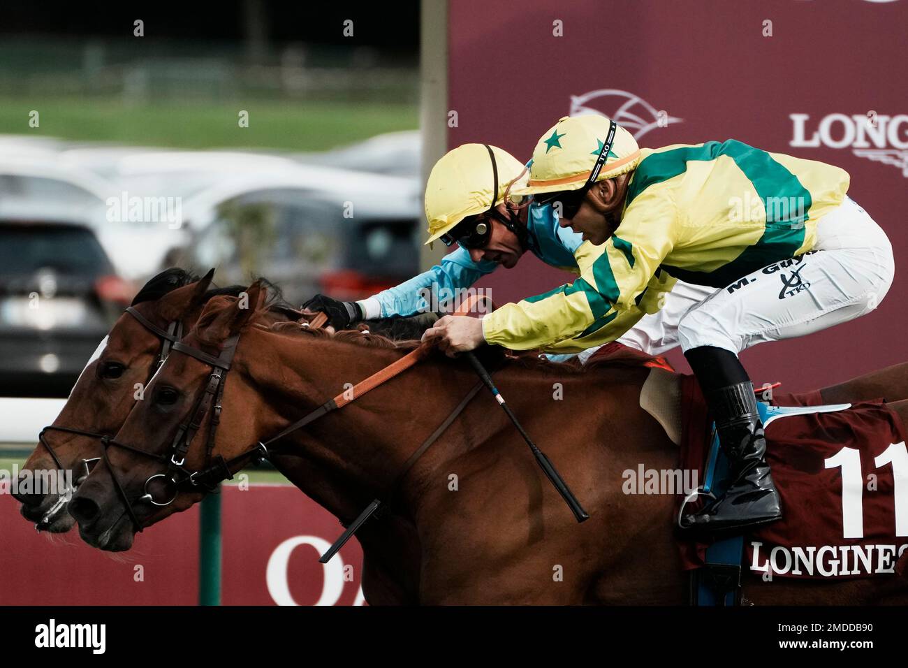 Jockey Maxime Guyon on Rougir foreground right races to win the