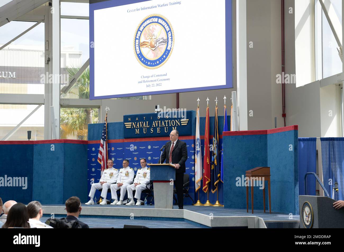 Retired Rear Adm. Steve L. Parode, a longstanding leader in the information warfare community, provides remarks as the guest speaker during the Center for Information Warfare Training (CIWT) change of command ceremony at the National Naval Aviation Museum, July 22, 2022.  Capt. Christopher G. Bryant relieved Capt. Marc W. Ratkus as CIWT’s commanding officer, while Ratkus also retired, concluding a 39-year military career. CIWT is charged with developing the future technical cadre of the Navy’s information warfare community. Stock Photo