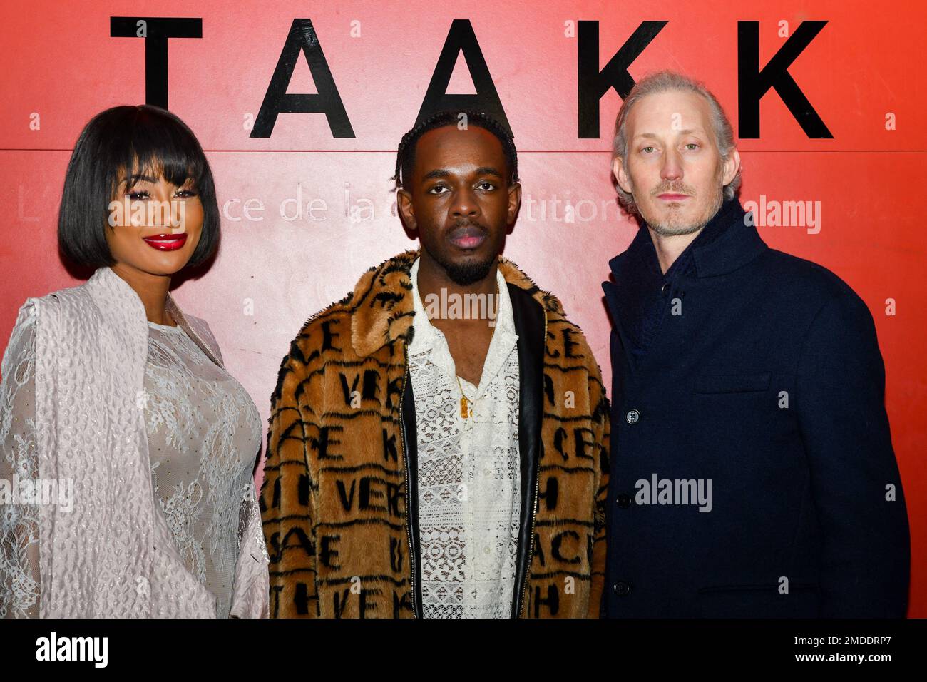 Miss Cote d'Ivoire 2005 and ex-wife of Ivorian international soccer player Zokora Didier Maestro, Brian Amont and Bruno Guery (Luc from Emily in Paris, Netflix series) (L-R) attend the TAAKK Paris Fashion Week - Menswear Fall-Winter 2023 show as part of Paris Fashion Week on January 22, 2023 in Paris, France. Photo by Jana Call me J/ABACAPRESS.COM Stock Photo