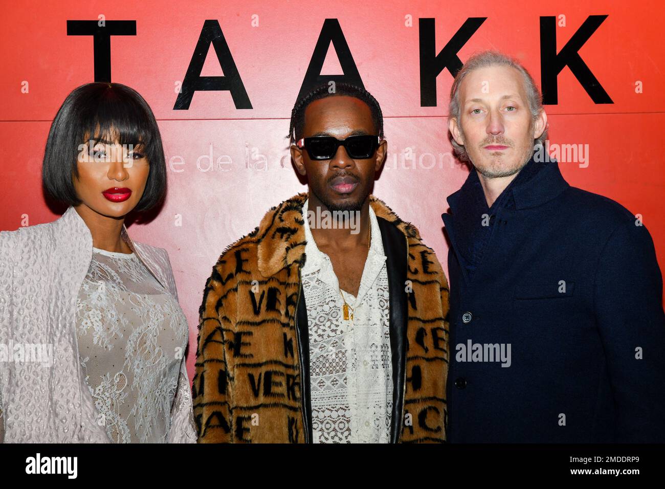 Miss Cote d'Ivoire 2005 and ex-wife of Ivorian international soccer player Zokora Didier Maestro, Brian Amont and Bruno Guery (Luc from Emily in Paris, Netflix series) (L-R) attend the TAAKK Paris Fashion Week - Menswear Fall-Winter 2023 show as part of Paris Fashion Week on January 22, 2023 in Paris, France. Photo by Jana Call me J/ABACAPRESS.COM Stock Photo