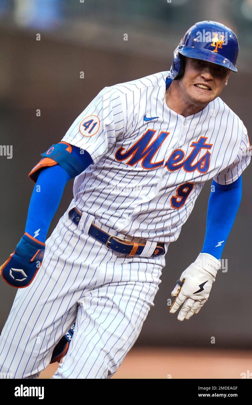 New York Mets' Brandon Nimmo (9) runs to third base for a triple during the  first inning in the first game of a doubleheader against the Miami Marlins  Tuesday, Sept. 28, 2021