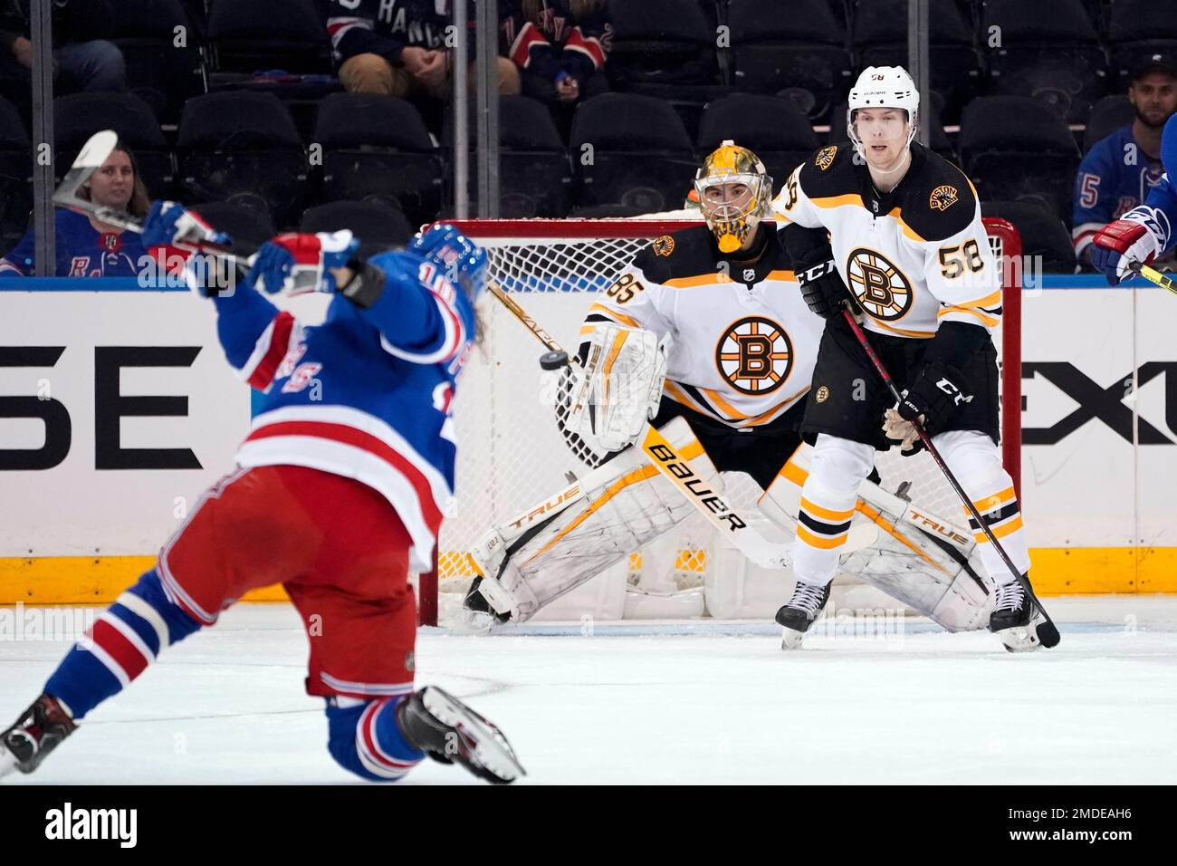 Boston Bruins goaltender Kyle Keyser (85) defends against the New Jersey  Devils in the third period of an NHL preseason hockey game Monday, Oct. 3,  2022, in Newark, N.J. The Devils won