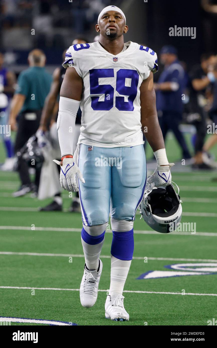 Dallas Cowboys defensive end Chauncey Golston (59) walks off the field  after the playing the Philadelphia Eagles in an NFL football game in  Arlington, Texas, Monday, Sept. 27, 2021. (AP Photo/Ron Jenkins