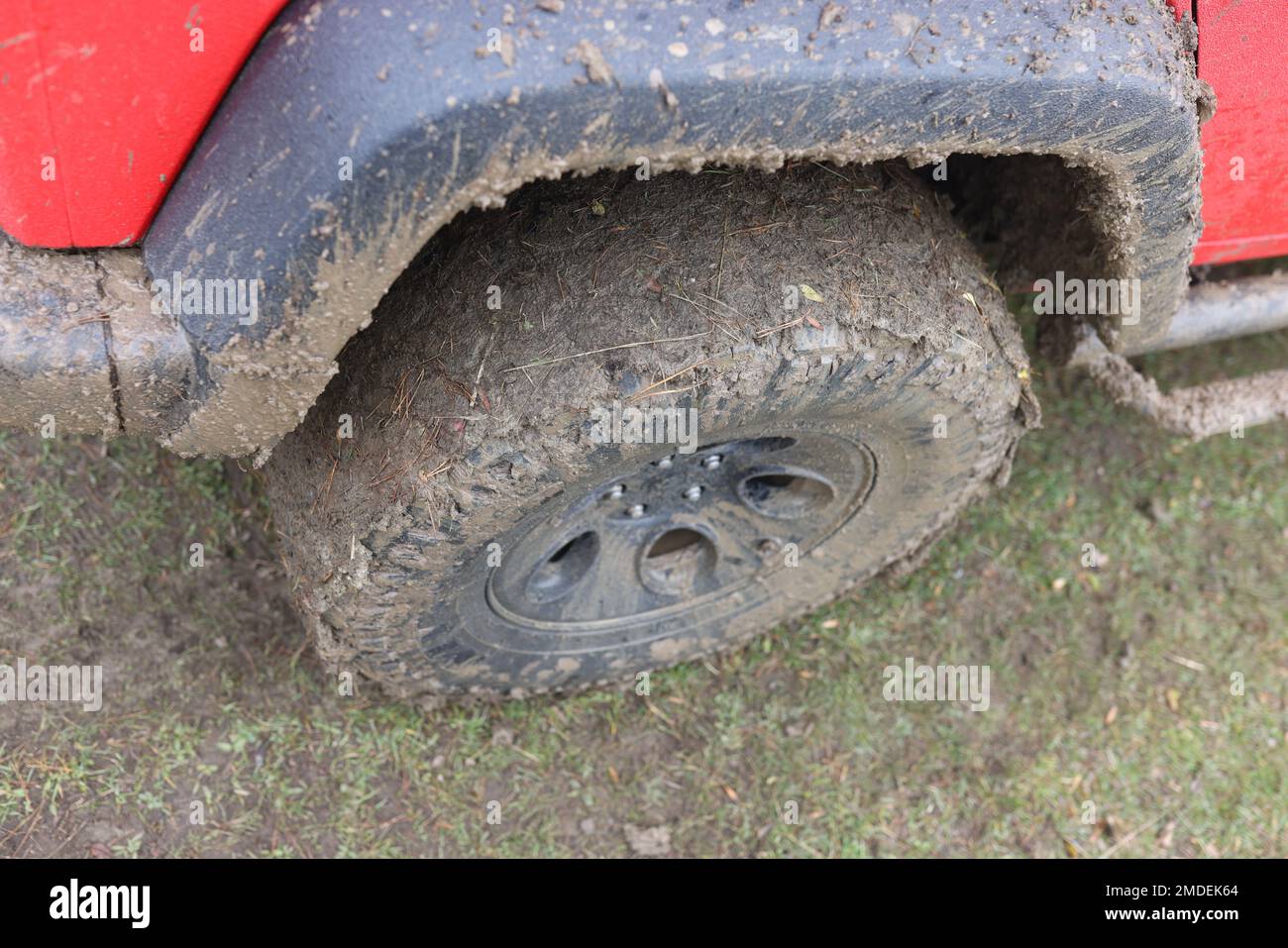 Close up of offroad car dirty wheel. Stock Photo