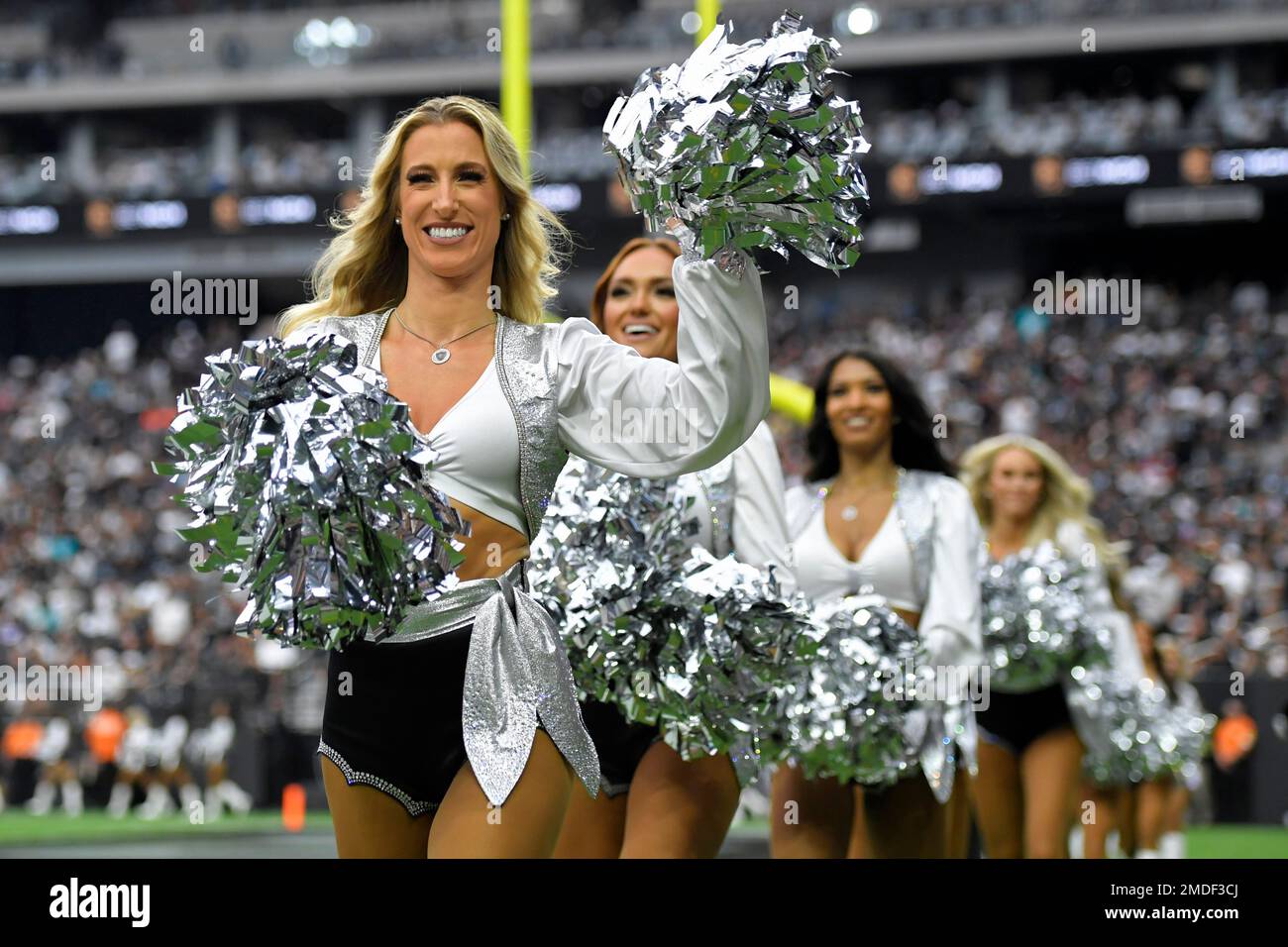 Las Vegas Raiderettes cheerleaders perform during the second half of an NFL  football game between the Las Vegas Raiders and the Chicago Bears, Sunday,  Oct. 10, 2021, in Las Vegas. (AP Photo/Rick