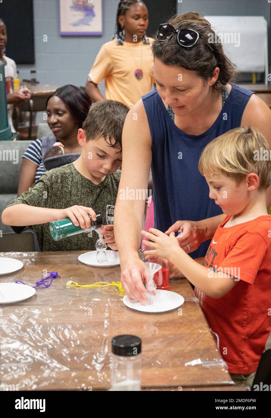 Fort Jackson library patrons make works of sand art at the Thomas Lee ...
