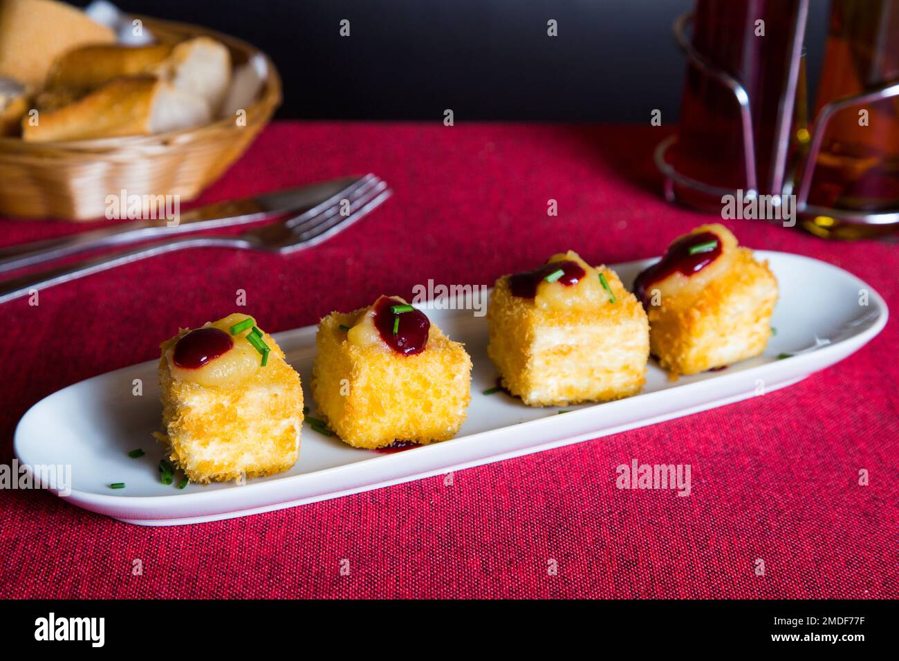 Deep fried brie cheese with berries jam Stock Photo Alamy