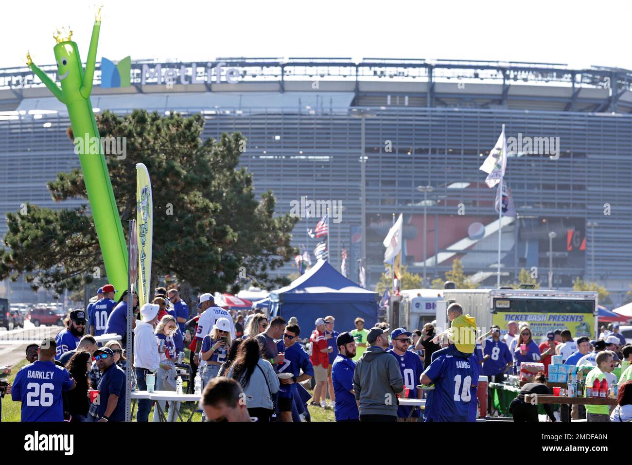 Fans tailgate before an NFL football game between the Atlanta