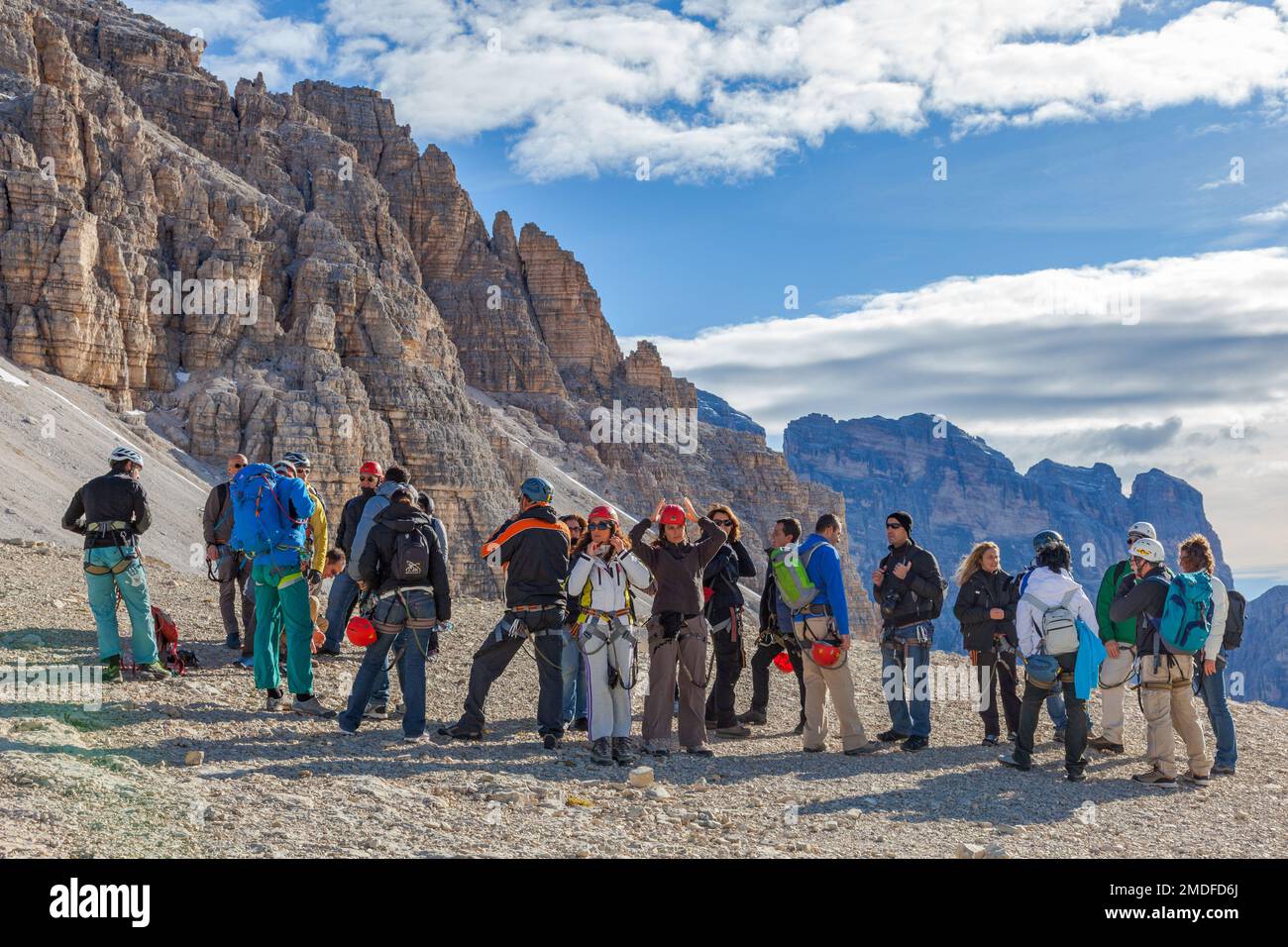 Group of hikers in the Dolomites mountains Stock Photo