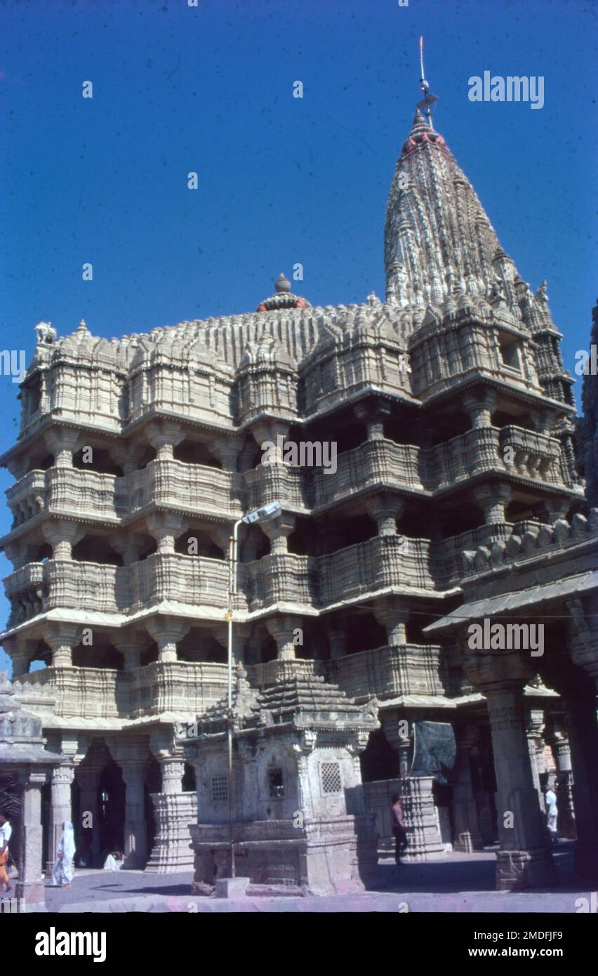 Dwarkadhish Temple, one of the Char Dham pilgrimages, is situated in the city of Dwarka in Gujarat. Dwarka lies on the banks of river Gomti. Dwarkadhish Temple also known as the Jagat Mandir, is a Chalukya styled architecture, dedicated to Lord Krishna. Stock Photo