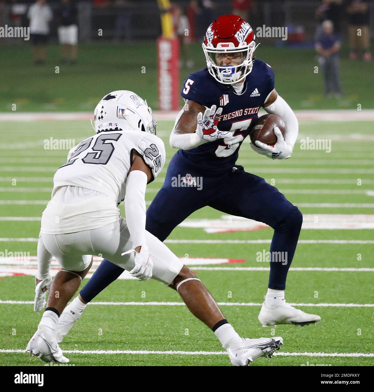 Fresno State wide receiver Jalen Cropper looks to avoid UNLV defensive back  Cameron Oliver during the first half of an NCAA college football game in  Fresno, Calif., Friday, Sept. 24, 2021. (AP