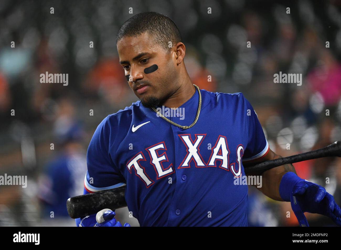 Texas Rangers' Andy Ibanez stretches from the dugout during the second  inning of a baseball game against the Baltimore Orioles, Thursday, Sept.  23, 2021, in Baltimore. (AP Photo/Terrance Williams Stock Photo - Alamy