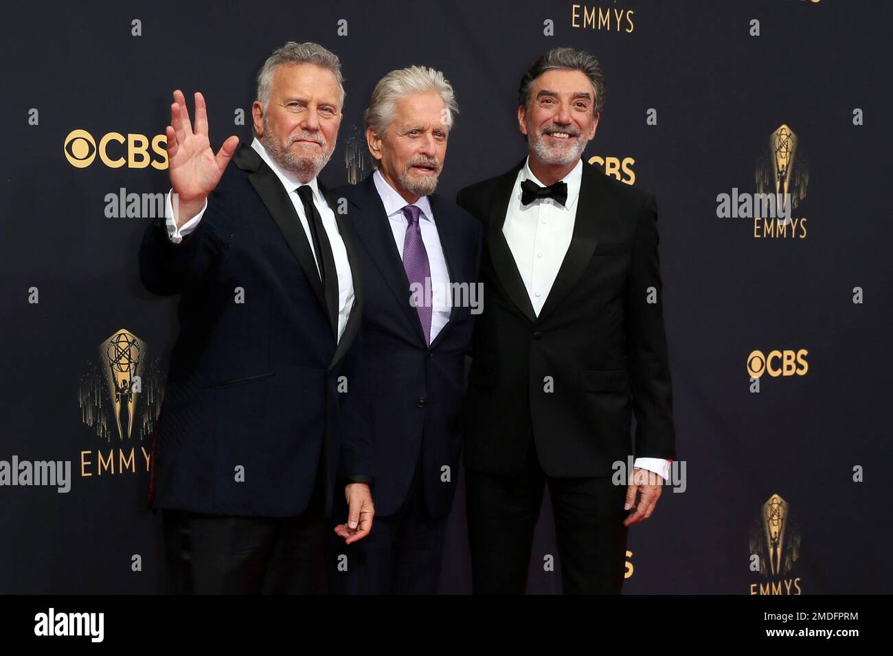 Paul Reiser, from left, Michael Douglas and Chuck Lorre arrive at the ...