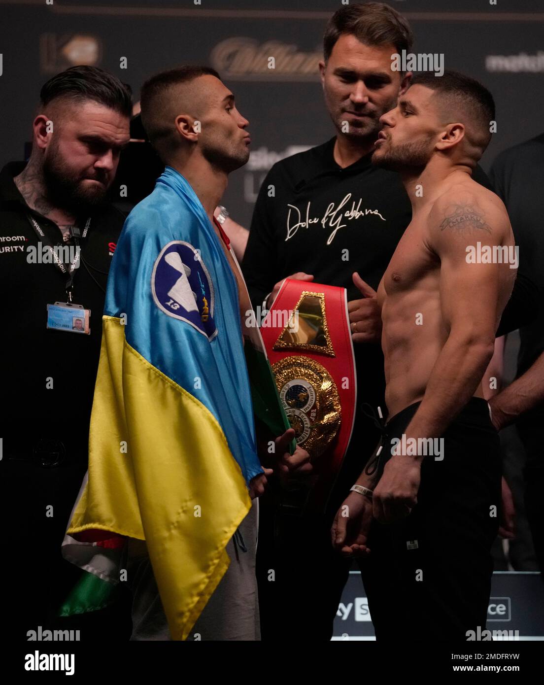 Florian Marku of Albania, right, faces Maxim Prodan, of the Ukraine during the official weigh in ahead of their upcoming boxing match, at the O2 Arena in London, Friday, Sept