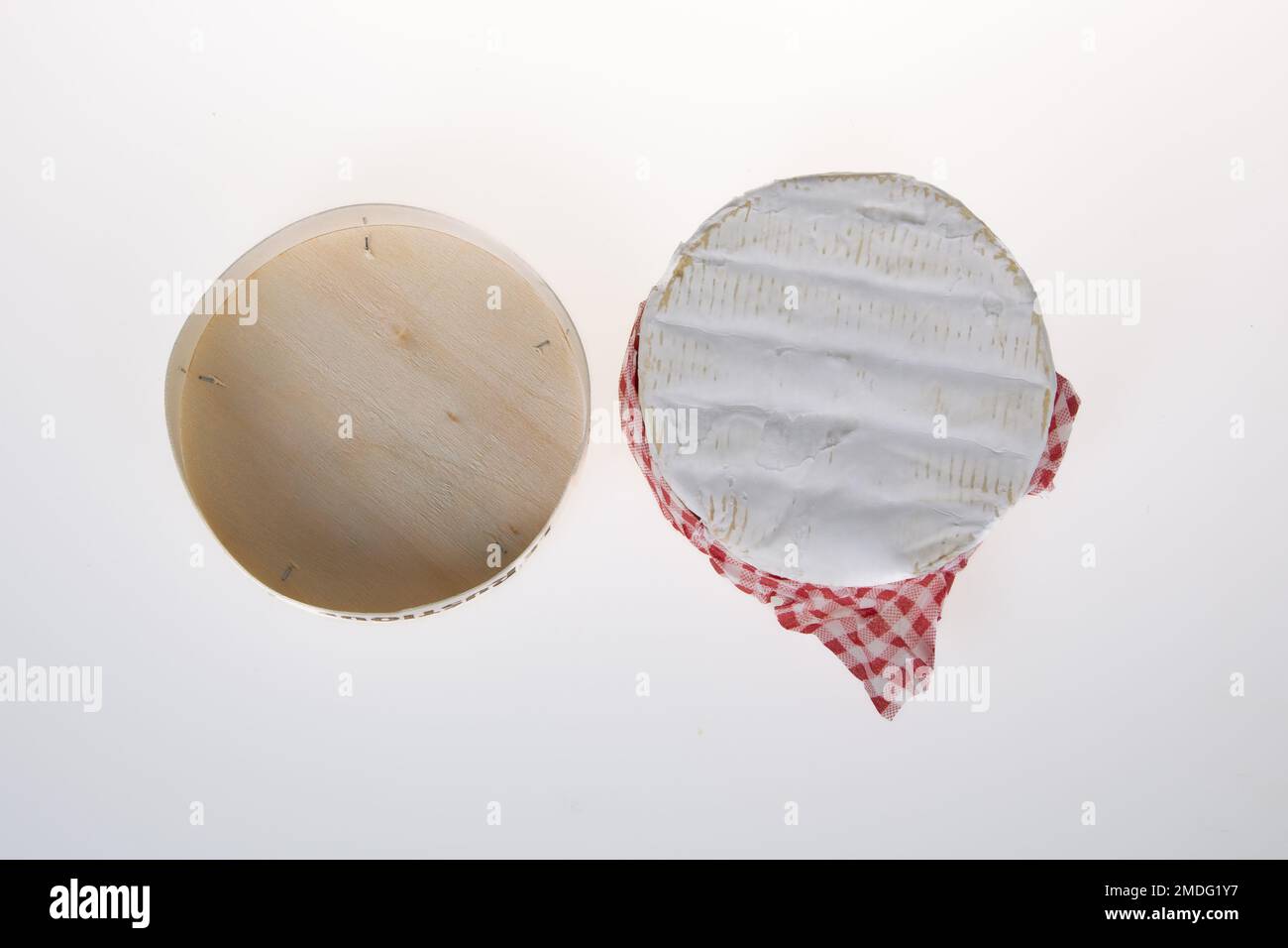 Round camembert French white mould aside wooden open box Wood Stock
