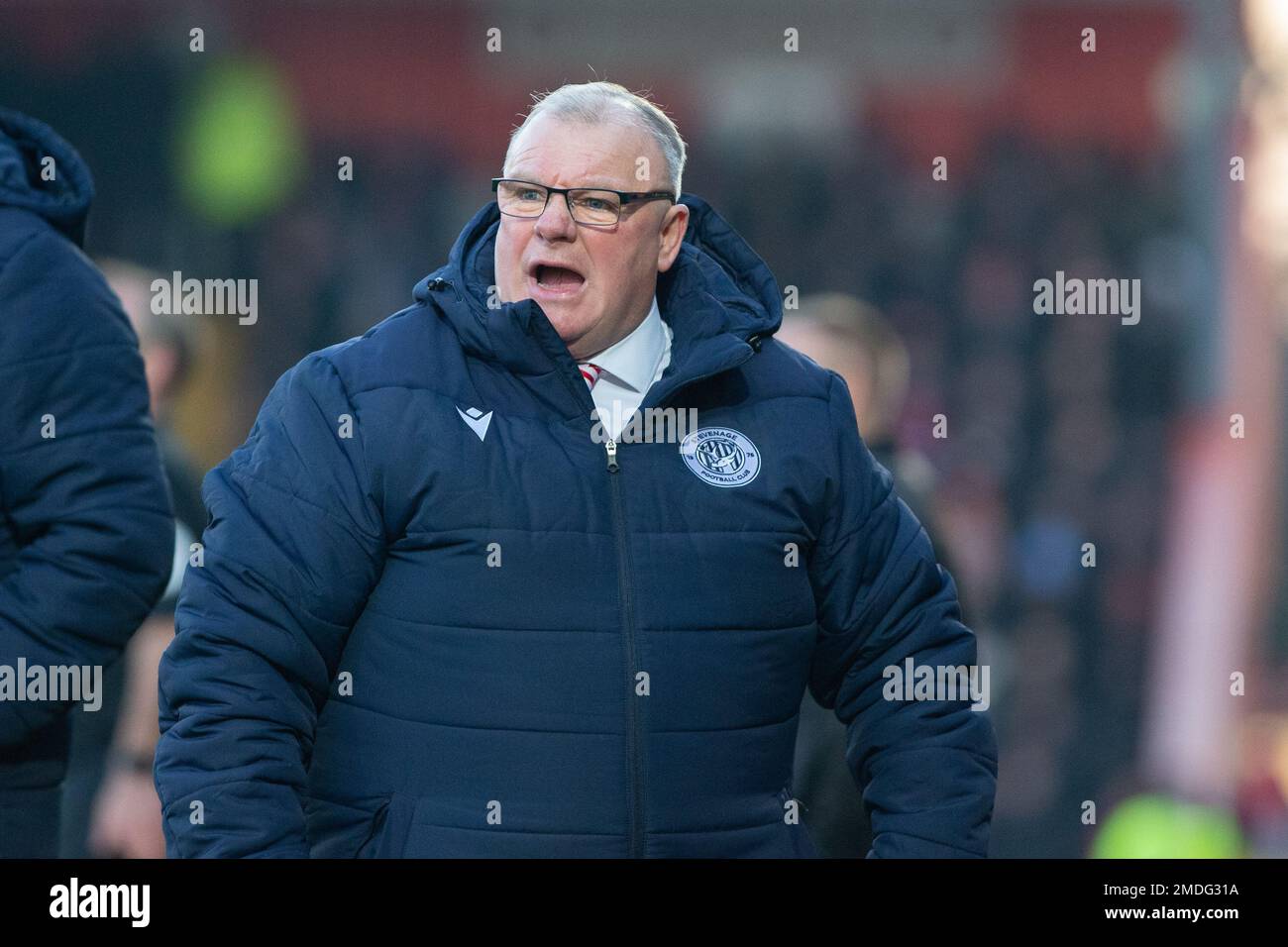 Stevenage FC manager / head coach Steve Evans shouting from touchline during game Stock Photo