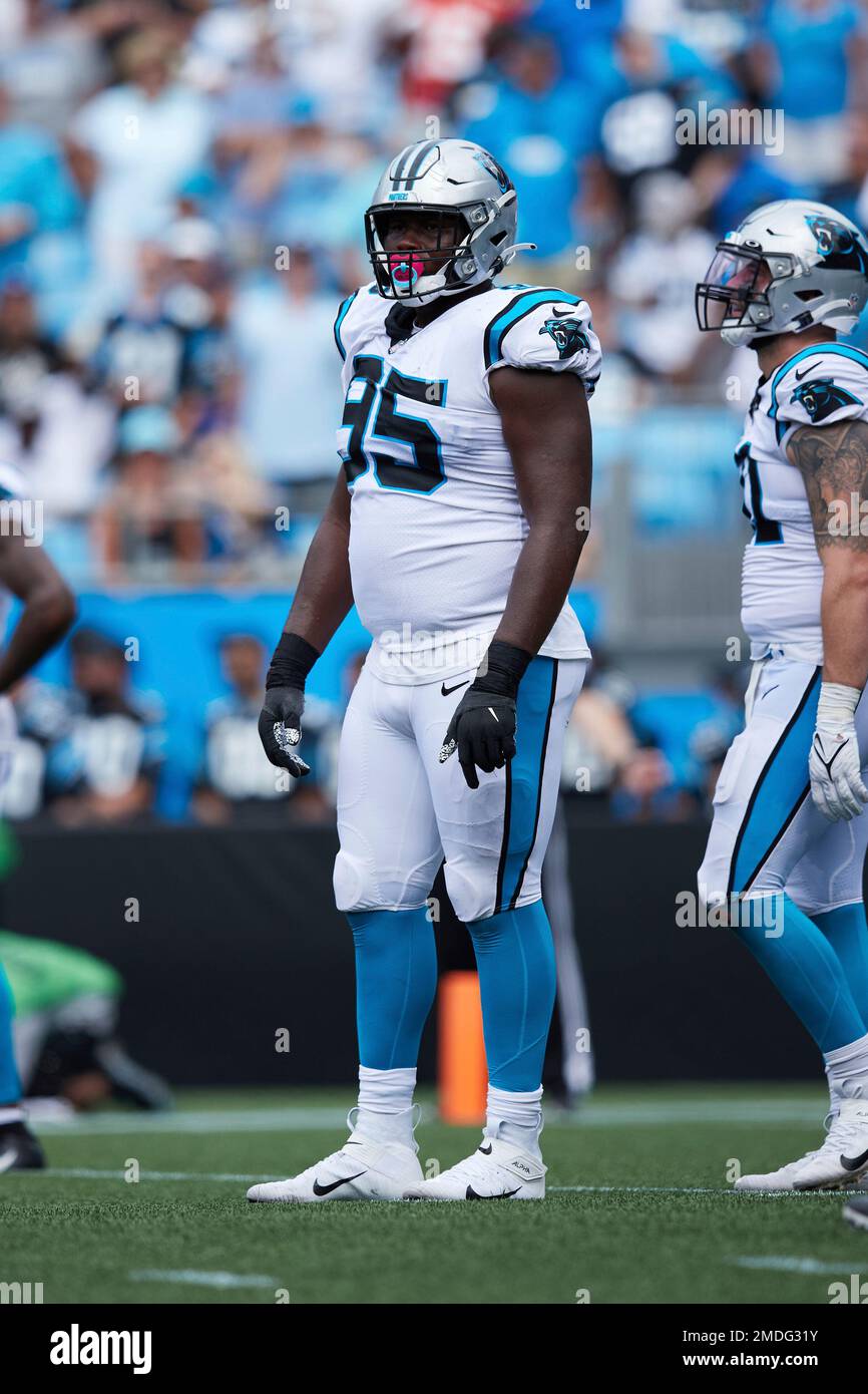 Carolina Panthers defensive tackle Derrick Brown (95) wears a Crucial Catch  t-shirt as he warms up prior to an NFL football game against the  Philadelphia Eagles, Sunday, Oct. 10, 2021, in Charlotte