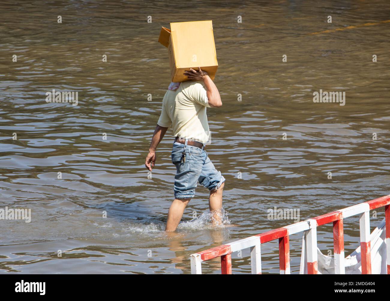 Man carries box water hi-res stock photography and images - Alamy