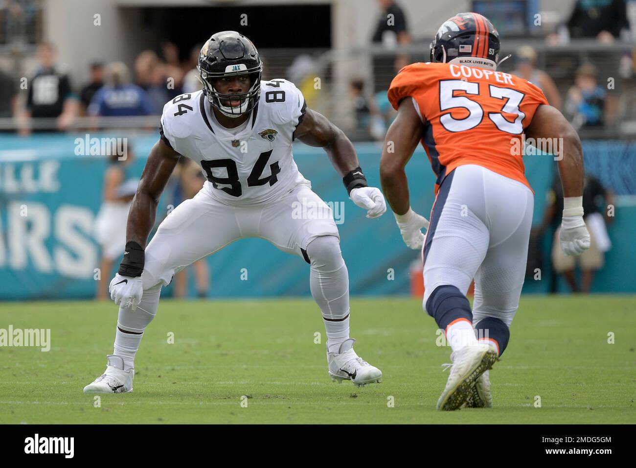 Jacksonville Jaguars tight end Chris Manhertz (84) walks off the field  after an NFL football game against the Denver Broncos at Wembley Stadium in  London, Sunday, Oct. 30, 2022. The Denver Broncos