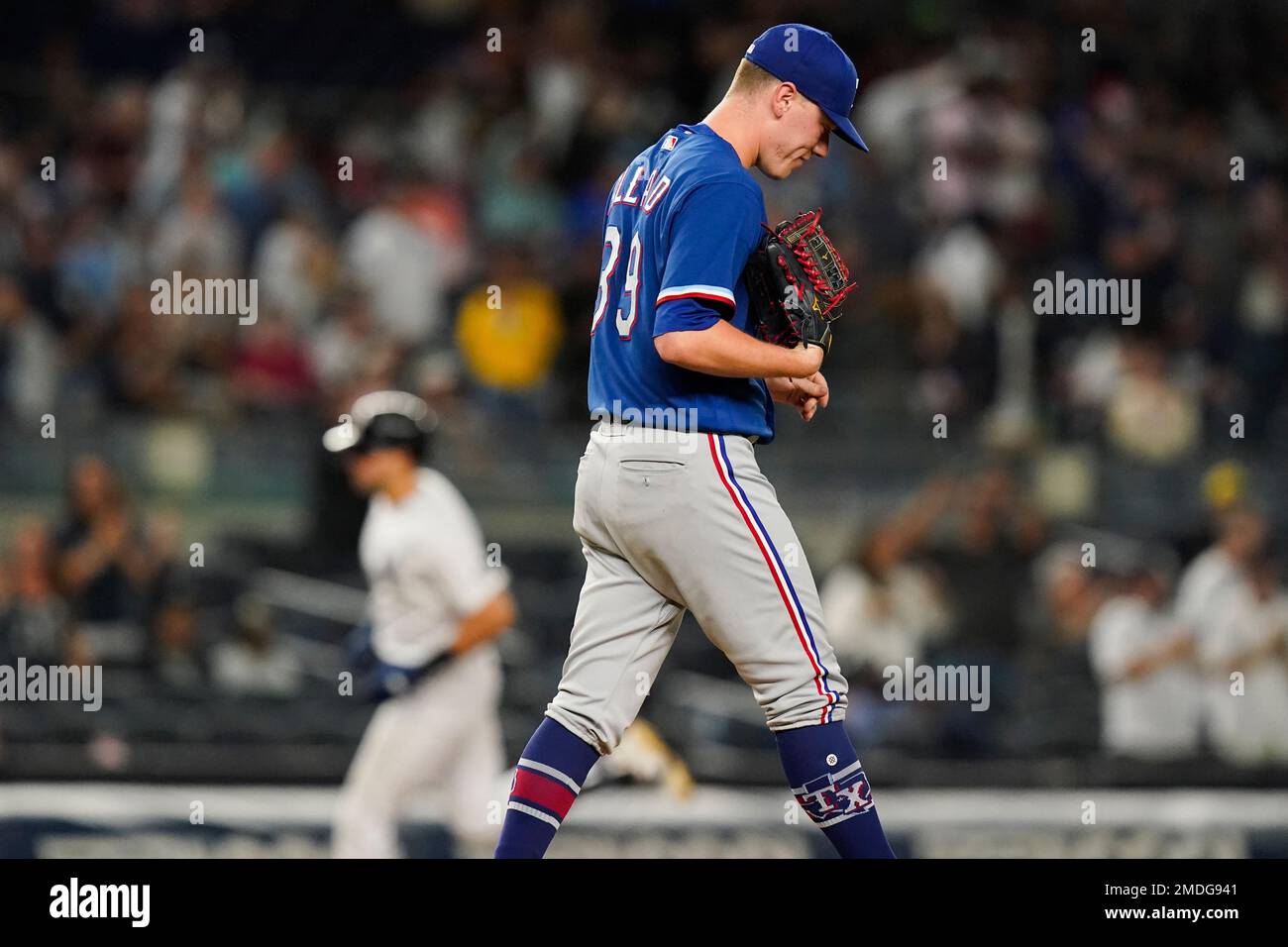 Texas Rangers relief pitcher Kolby Allard (39) reacts as New York Yankees'  Joey Gallo runs the bases after hitting a home run during the sixth inning  of a baseball game Tuesday, Sept.