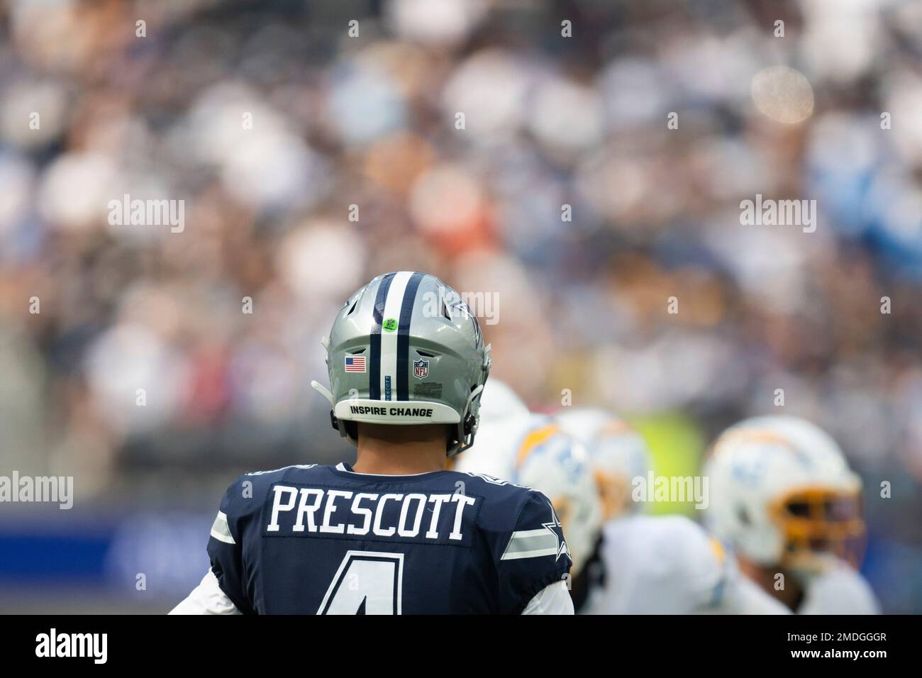 Dallas Cowboys quarterback Dak Prescott (4)'s decal 'Inspire Change' is  seen during an NFL football game against the Los Angeles Chargers Sunday,  Sept. 19, 2021, in Inglewood, Calif. (AP Photo/Kyusung Gong Stock