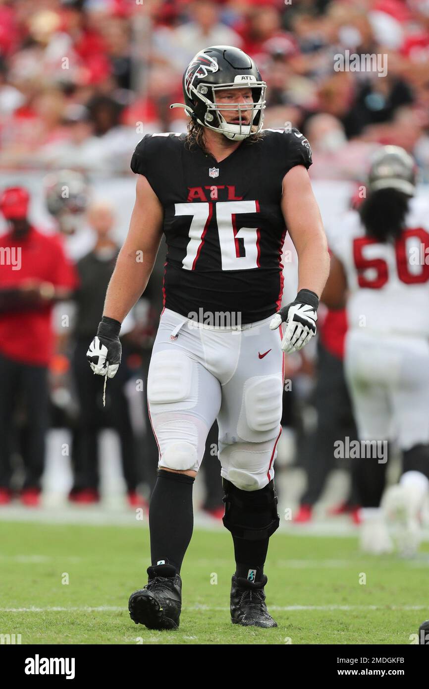 Atlanta Falcons offensive tackle Kaleb McGary (76) watches the