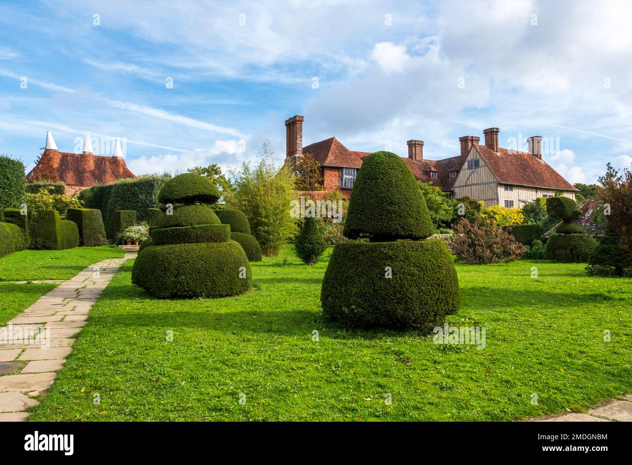 Great Dixter from the topiary garden, East Sussex, UK Stock Photo