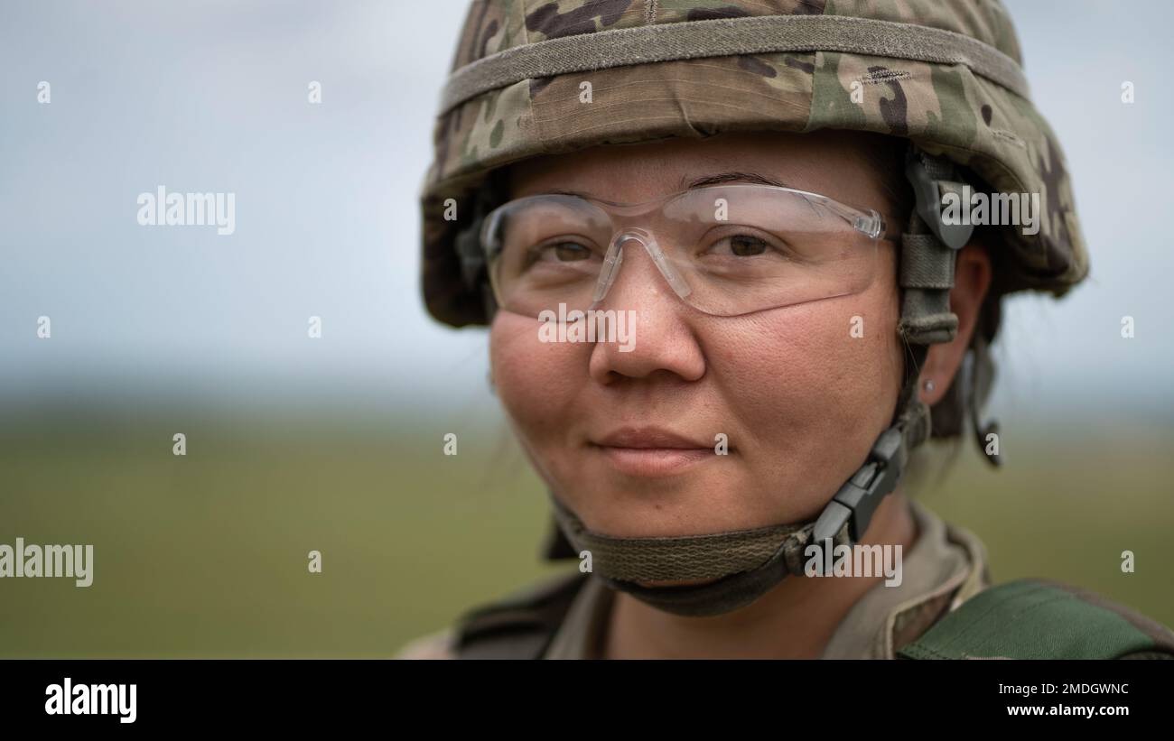 U.S. Army Sgt. Marie Vanneste, 84th Training Command, Taskforce Railgun range safety officer poses for a portrait during an M2 machine gun familiarization range for Warrior Exercise 78-22-02 at Fort McCoy, Wisconsin, July 23, 2022. Vanneste is a Radiological, Nuclear and Explosive specialist and serves as Senior Gunner Instructor for the U.S. Army Reserve’s Senior Gunner Course held at Fort Hunter-Liggett, California. Stock Photo