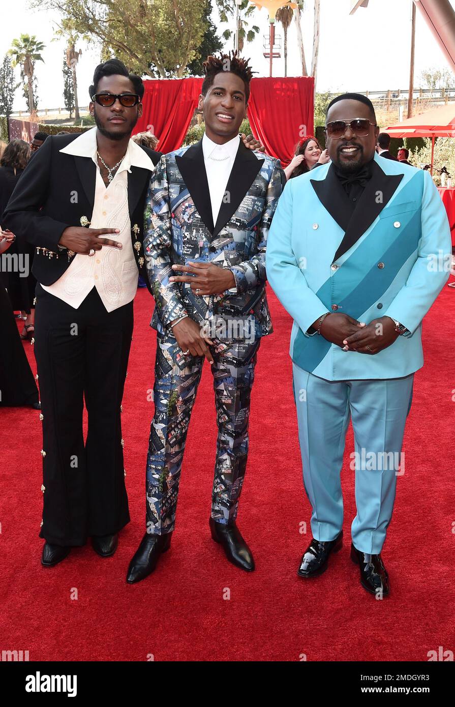 Leon Bridges, from left, Jon Batiste and Cedric The Entertainer arrive