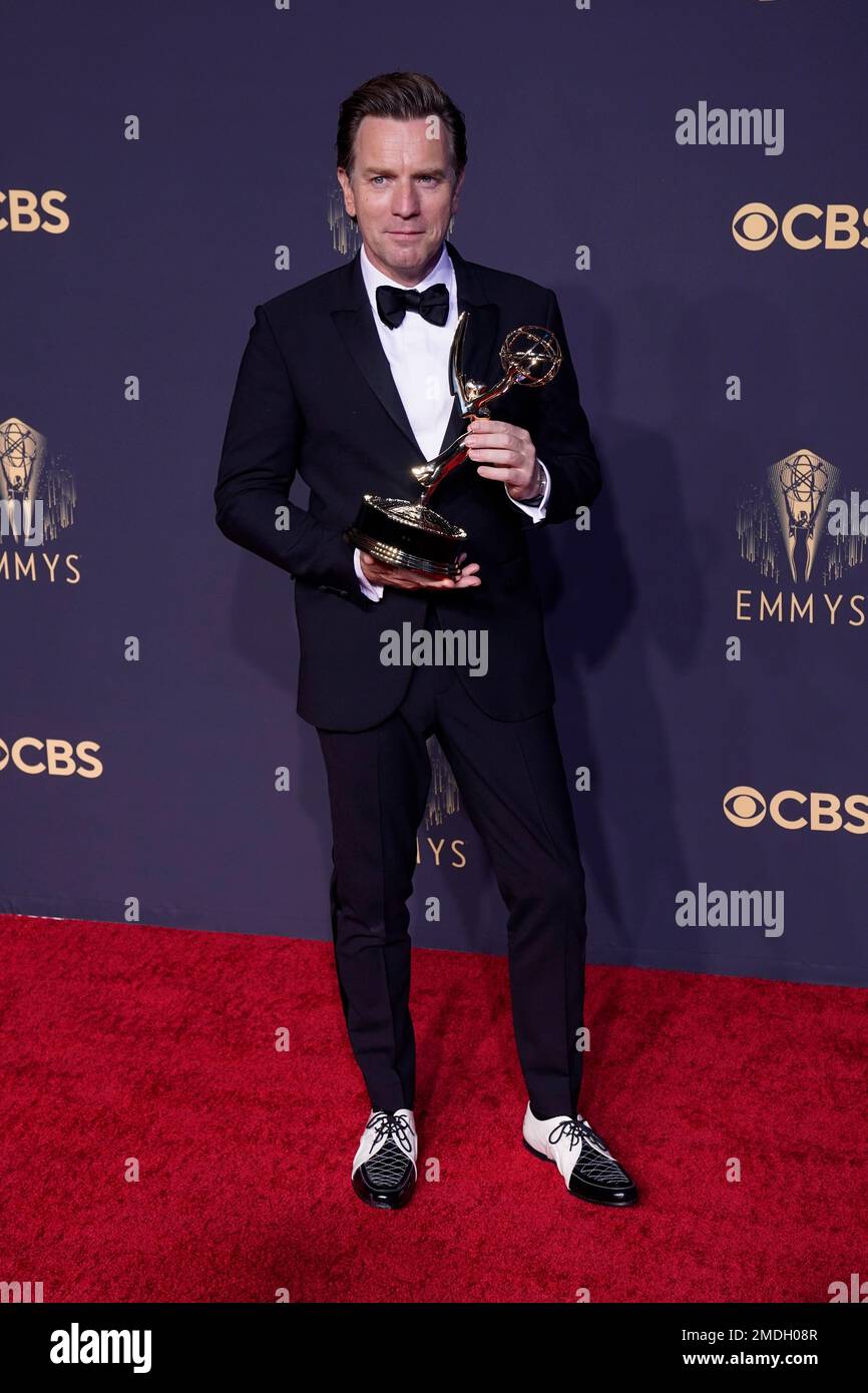 Ewan McGregor poses with the award for outstanding lead actor in a