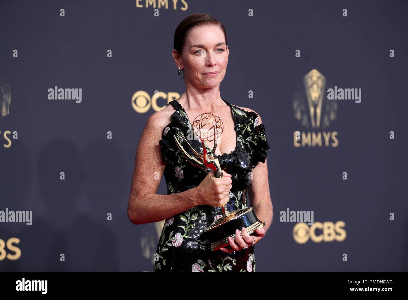 Julianne Nicholson poses for a photo with the award for outstanding