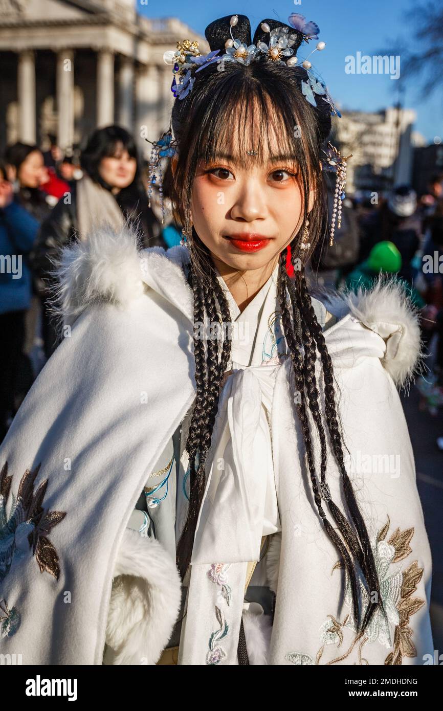 A chinese girl in traditional dress at the lunar new year celebration in Trafalgar Square. Stock Photo
