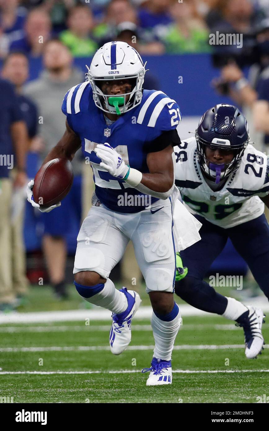 INDIANAPOLIS, IN - DECEMBER 18: Indianapolis Colts Running Back Nyheim  Hines (21) warms up for the NFL football game between the New England  Patriots and the Indianapolis Colts on December 18, 2021