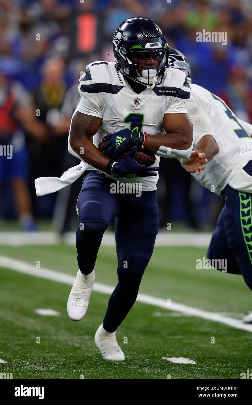 D'Wayne Eskridge of the Seattle Seahawks carries the ball against