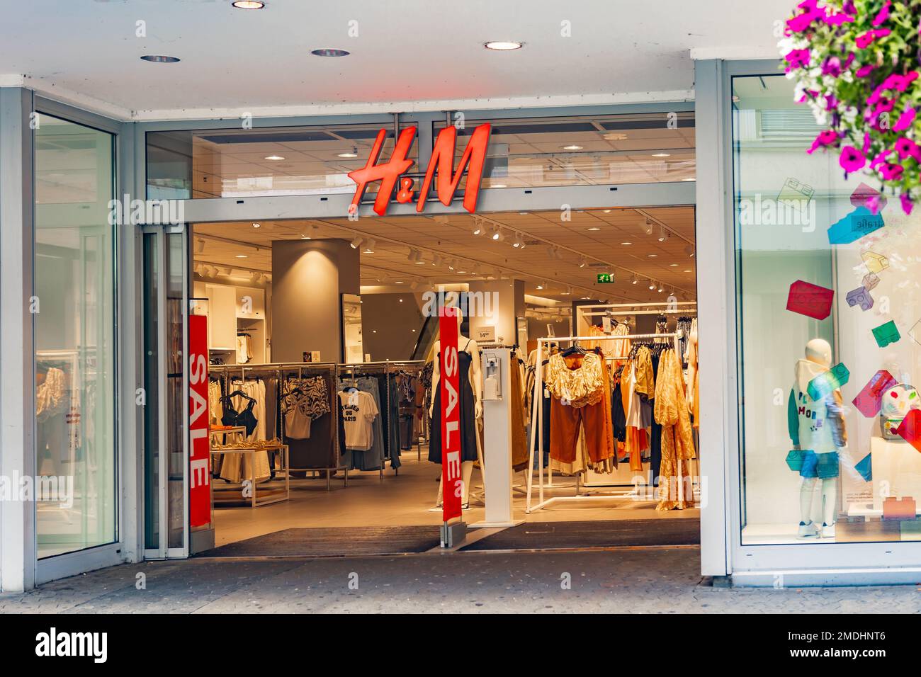 Neuwied, Germany - July 09, 2022: entrance of the local H&M store with  stand-up displays "Sale Stock Photo - Alamy