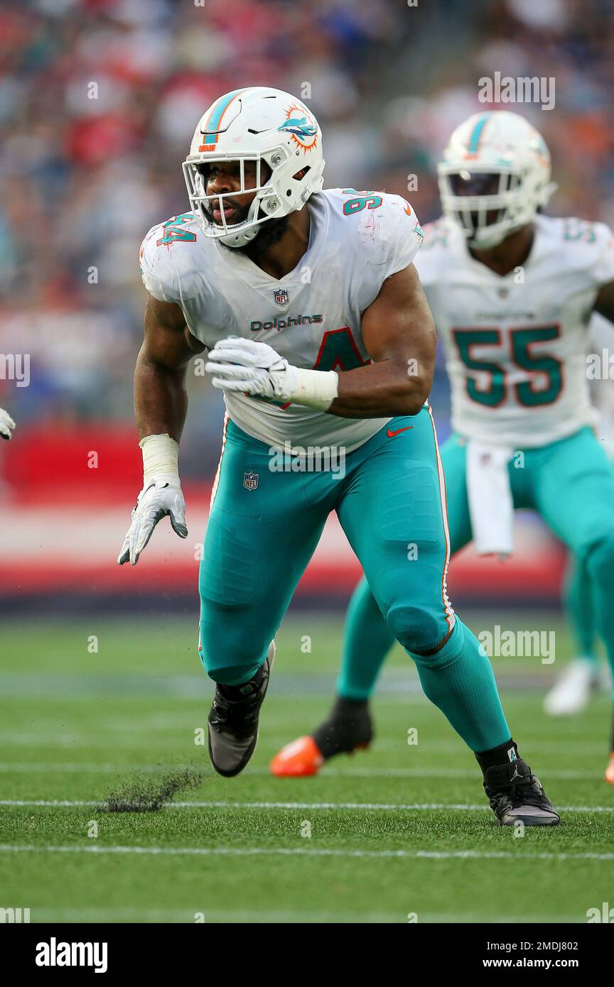 Miami Dolphins defensive tackle Christian Wilkins (94) cheers after scoring  a touchdown, during the first half at an NFL football game against the  Cincinnati Bengals, Sunday, Dec. 22, 2019, in Miami Gardens